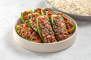 Calabazas rellenas de picadillo y arroz al ajo